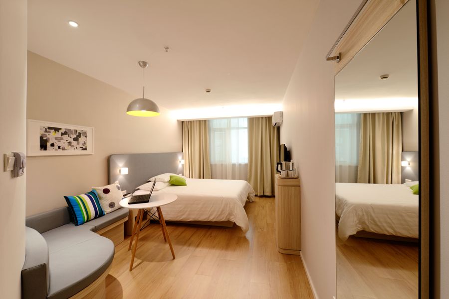 Illustrative city residence with a welcoming bedroom